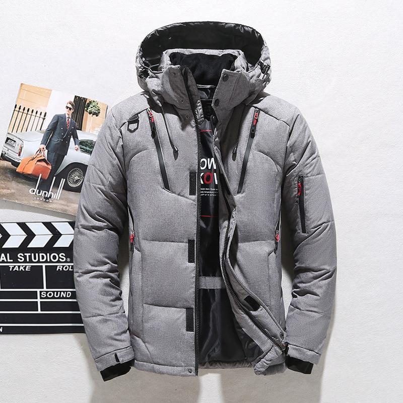 Jarek | Warm quilted jacket with hood - Image 17